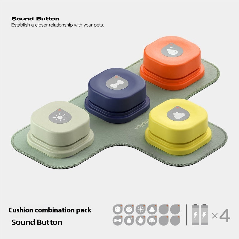 Orange Poppy pet talking button toy set of four colorful sound buttons on a green cushion combination pad