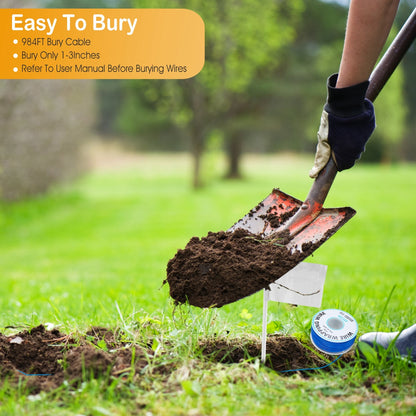 Person installing adjustable pet boundary collar system burying wire with shovel in garden