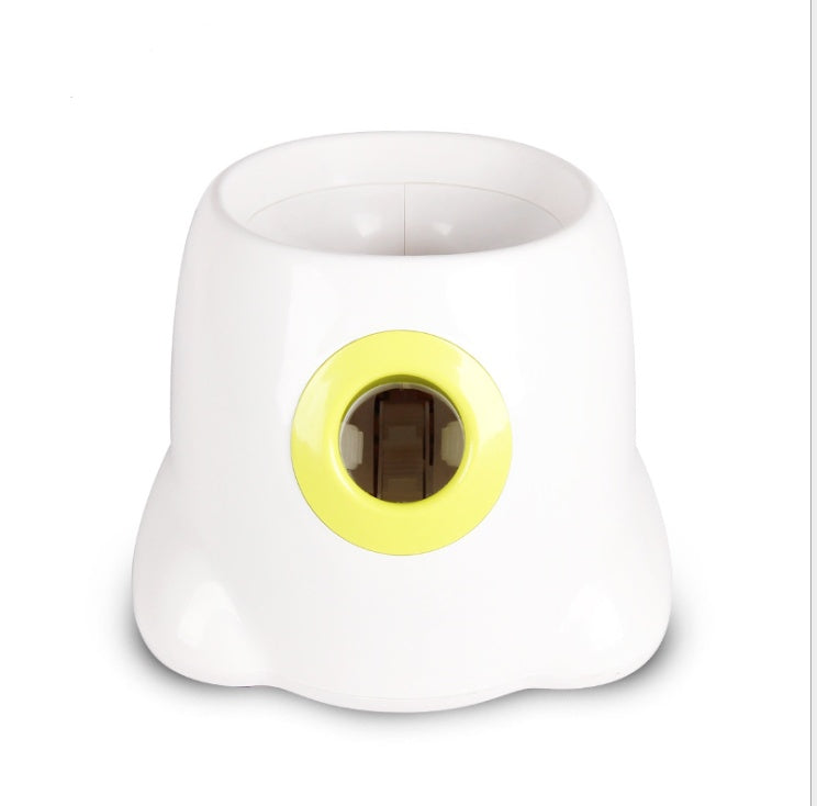 Orange Poppy automatic dog ball launcher white plastic unit with yellow launch port and top ball hopper
