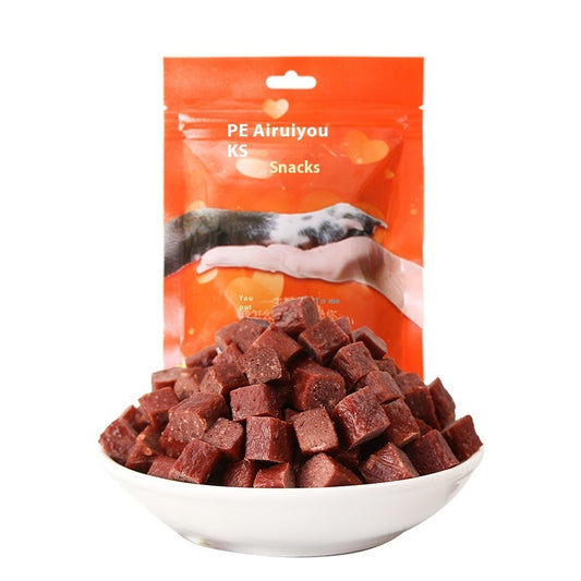 Orange Poppy chicken and beef meat cubes for dogs in resealable orange bag with bowl of bite size treats