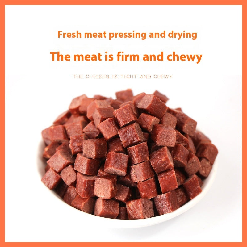 Orange Poppy bowl of firm chewy chicken and beef meat cubes for dogs piled in white bowl