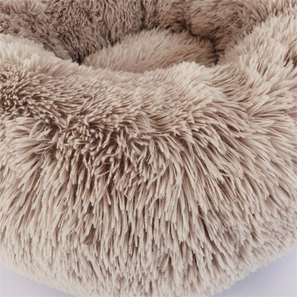 Orange Poppy round fluffy cat bed in beige shaggy faux fur donut style with bolstered edge for comfort
