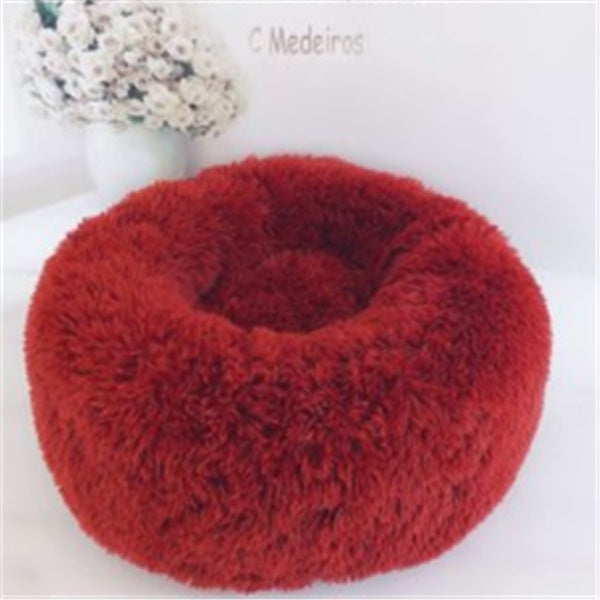 Orange Poppy round fluffy cat bed in deep red plush donut design for cozy pet sleeping and nesting