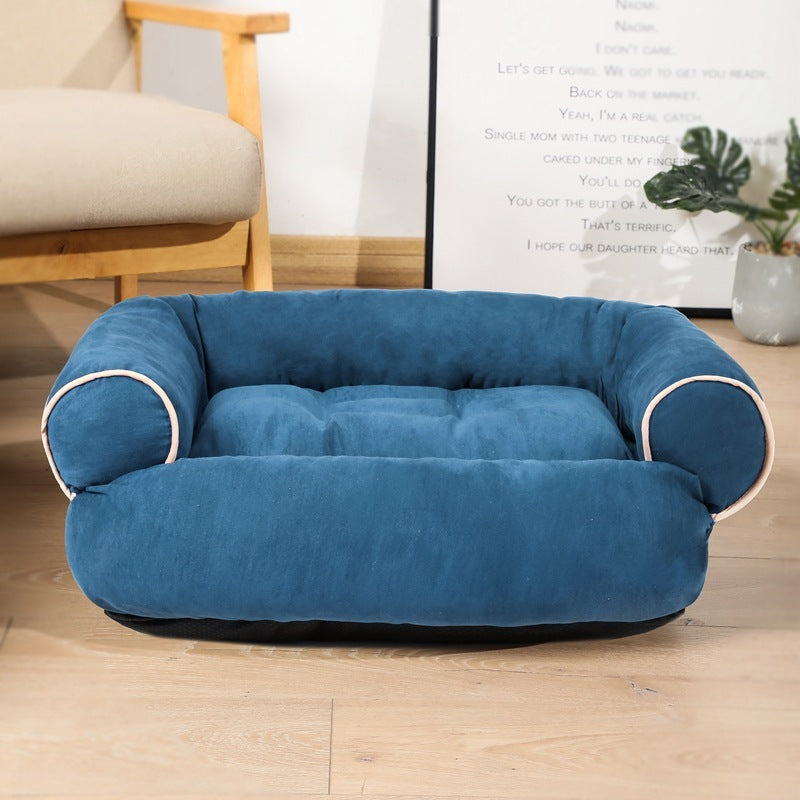 Orange Poppy blue plush warm cat and dog cushion with bolstered sides tufted center on wood floor