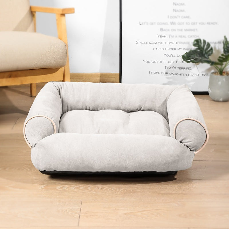 Orange Poppy warm cat and dog cushion in light gray plush with bolstered sides and tufted center