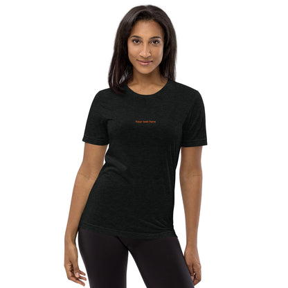 Woman wearing a black custom pet t-shirt with customizable text on front by Pet Treat