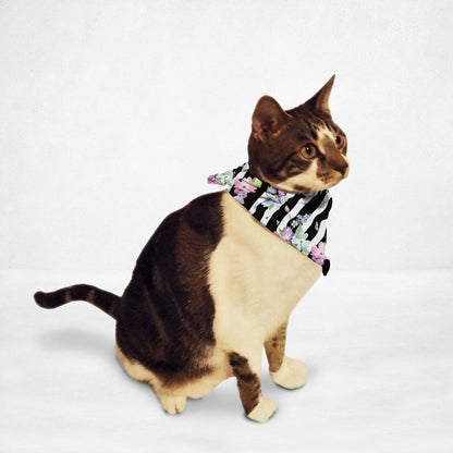 Cat wearing Orange Poppy floral pet bandana with black and white stripes and purple flowers