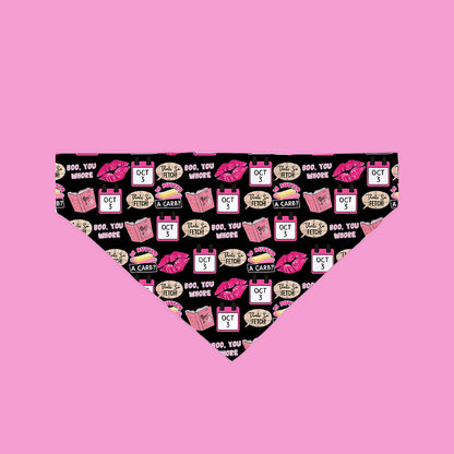 Funny dog bandana with black background and colorful patterns of lips, calendars, and humorous phrases
