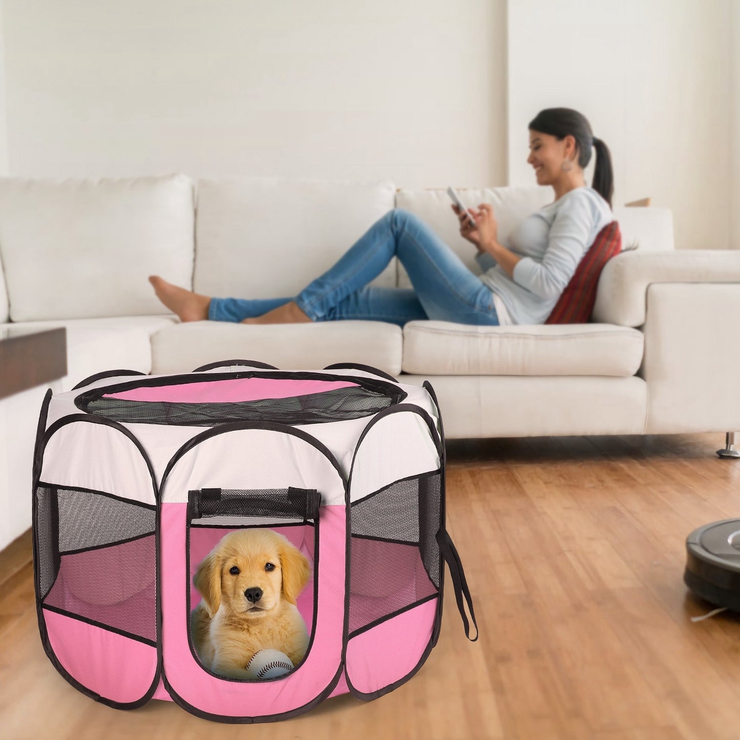 Indoor outdoor pet playpen for dogs and cats in pink with a puppy inside on a wooden floor
