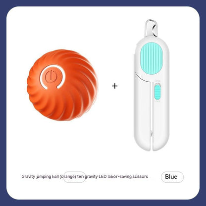 Interactive dog ball toy in orange with gravity jumping feature and included LED scissors