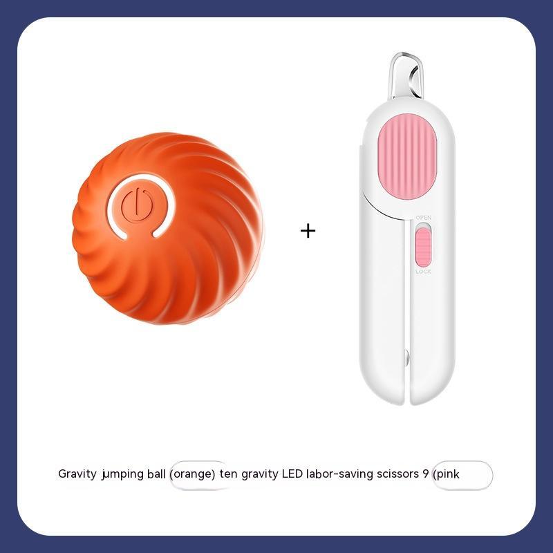 Interactive dog ball toy set with an orange gravity jumping ball and pink LED scissors