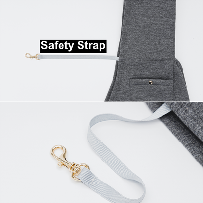 Close-up of safety strap with gold clasp on gray pet sling carrier for small dogs by Emerald Alfie