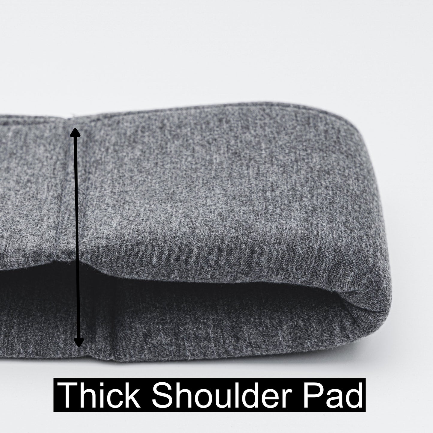 Thick shoulder pad detail on Emerald Alfie pet sling carrier for small dogs in gray fabric