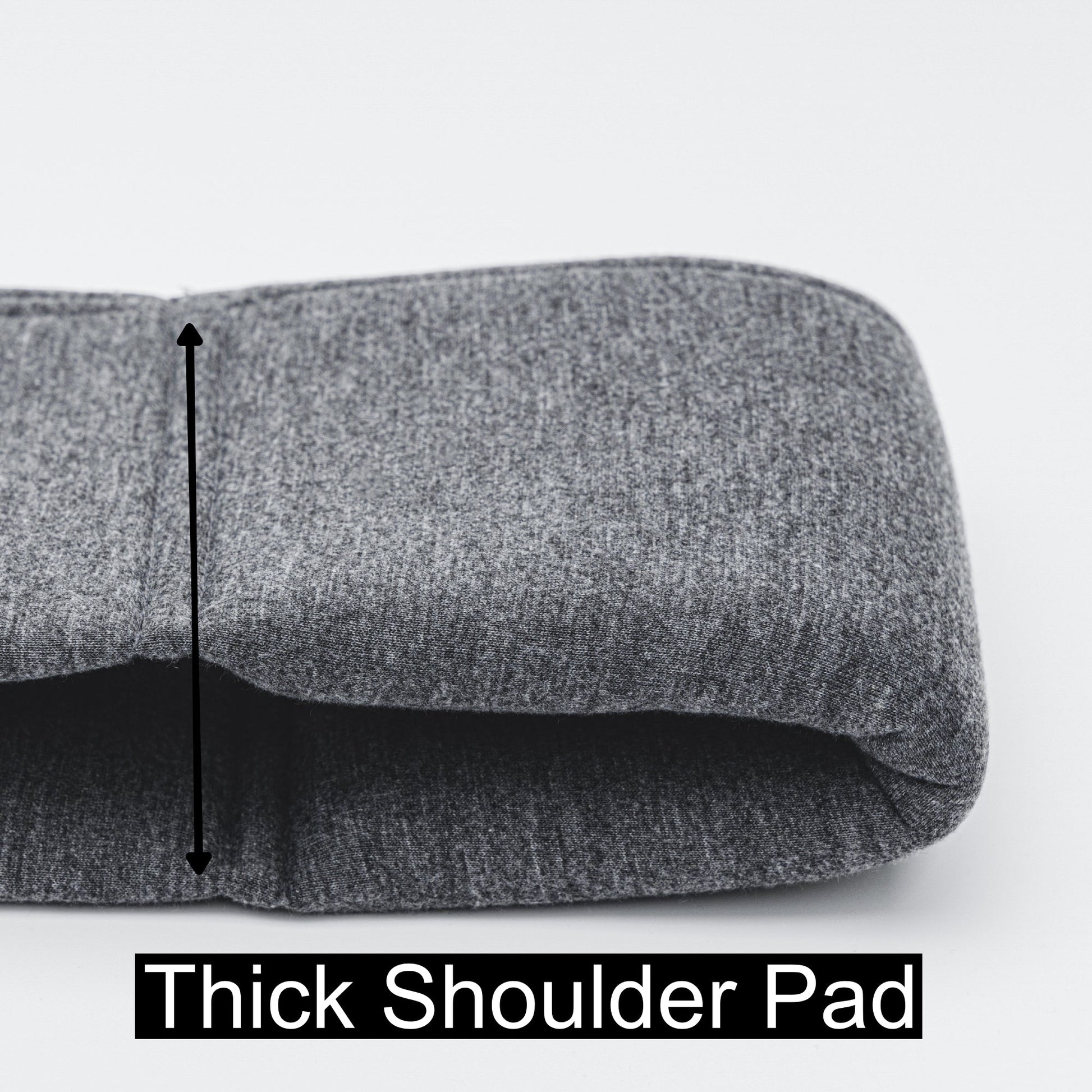 Thick shoulder pad detail on Emerald Alfie pet sling carrier for small dogs in gray fabric
