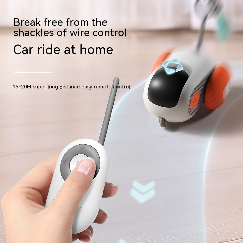 Orange Poppy remote control cat toy with handheld white controller and wheeled toy car for indoor play
