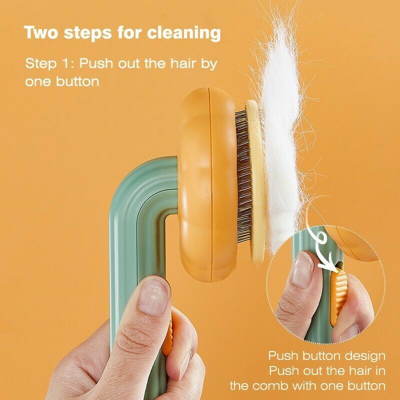 Orange Poppy self cleaning slicker brush for pets with push button hair eject hand holding brush and removed fur