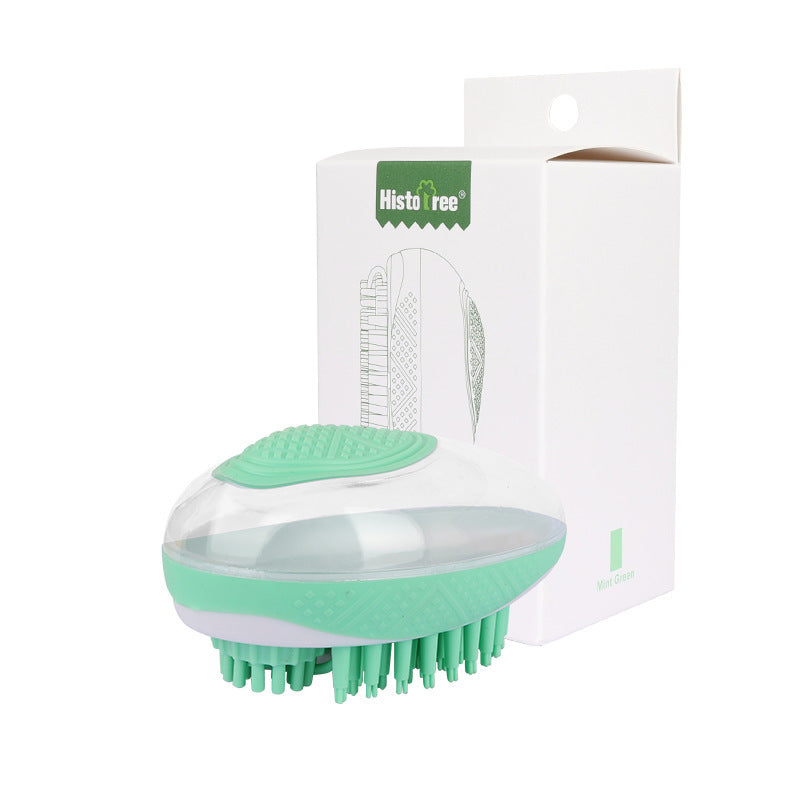 Pet Haven Delights cat and dog massage comb in green, perfect for grooming and relaxation