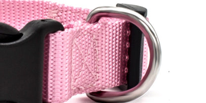 Durable pink adjustable pet collar with sturdy metal D-ring for secure leash attachment