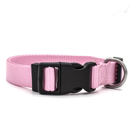 Adjustable pet collar in pink with durable buckle and metal D-ring for easy attachment