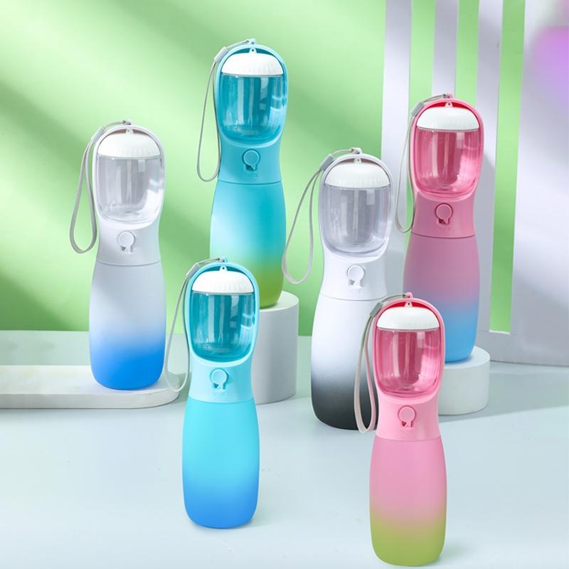 Assorted pet travel water bottle designs in blue, pink, white, and gradient colors for on-the-go hydration