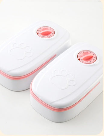 Orange Poppy white and pink dual portion smart pet food dispenser for cats and dogs with paw design