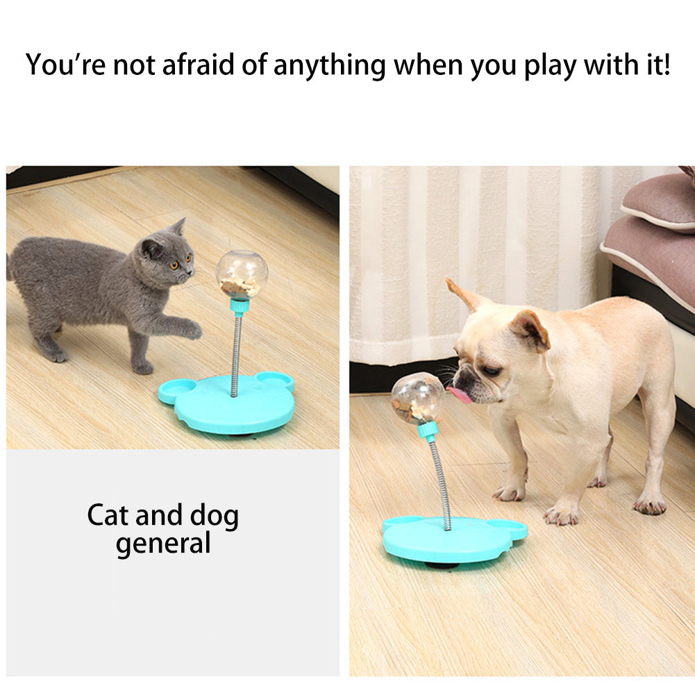 Orange Poppy interactive cat feeder toy teal paw base with clear rotating ball on spring pole played by cat and dog