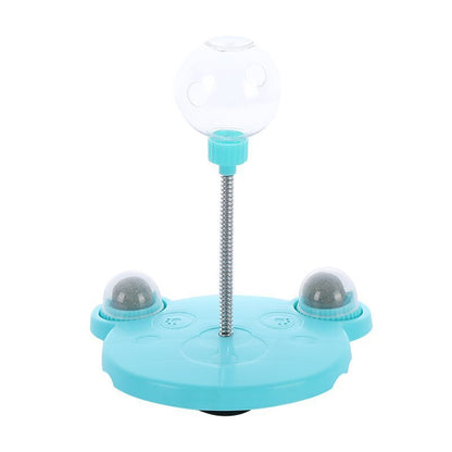 Orange Poppy turquoise bounce base with spring ball and dual treat pods interactive cat feeder toy