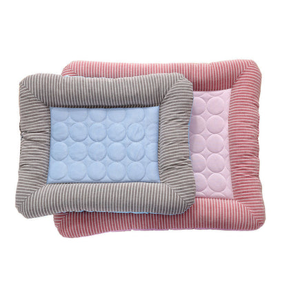 Orange Poppy striped rectangular pet mats pair with quilted centers in blue and pink cooling bed for dogs and cats