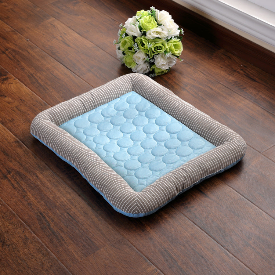 Orange Poppy cooling bed for dogs and cats rectangular quilted blue center with gray striped bolster
