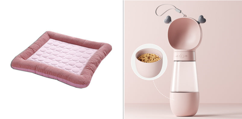 Orange Poppy pink cooling bed for dogs and cats with raised edges shown next to portable water bottle and food dispenser
