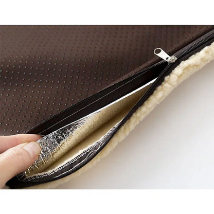 Yellow Pandora self warming pet mat with zipper showing metallic thermal layer and soft fleece inside